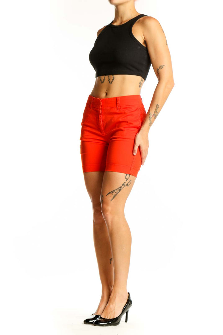 Front view of red J.Crew cotton chino shorts on model