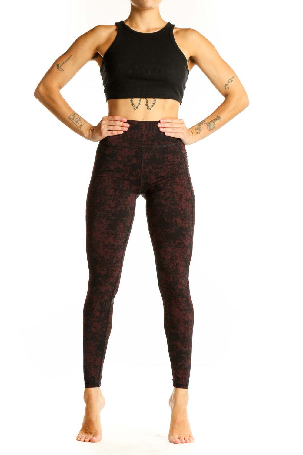 Front view of Sweaty Betty burgundy textured high-waist workout leggings