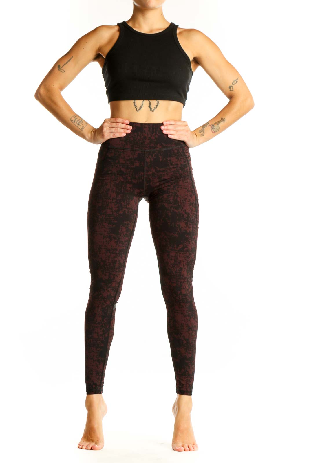 Front view of Sweaty Betty burgundy textured high-waist workout leggings