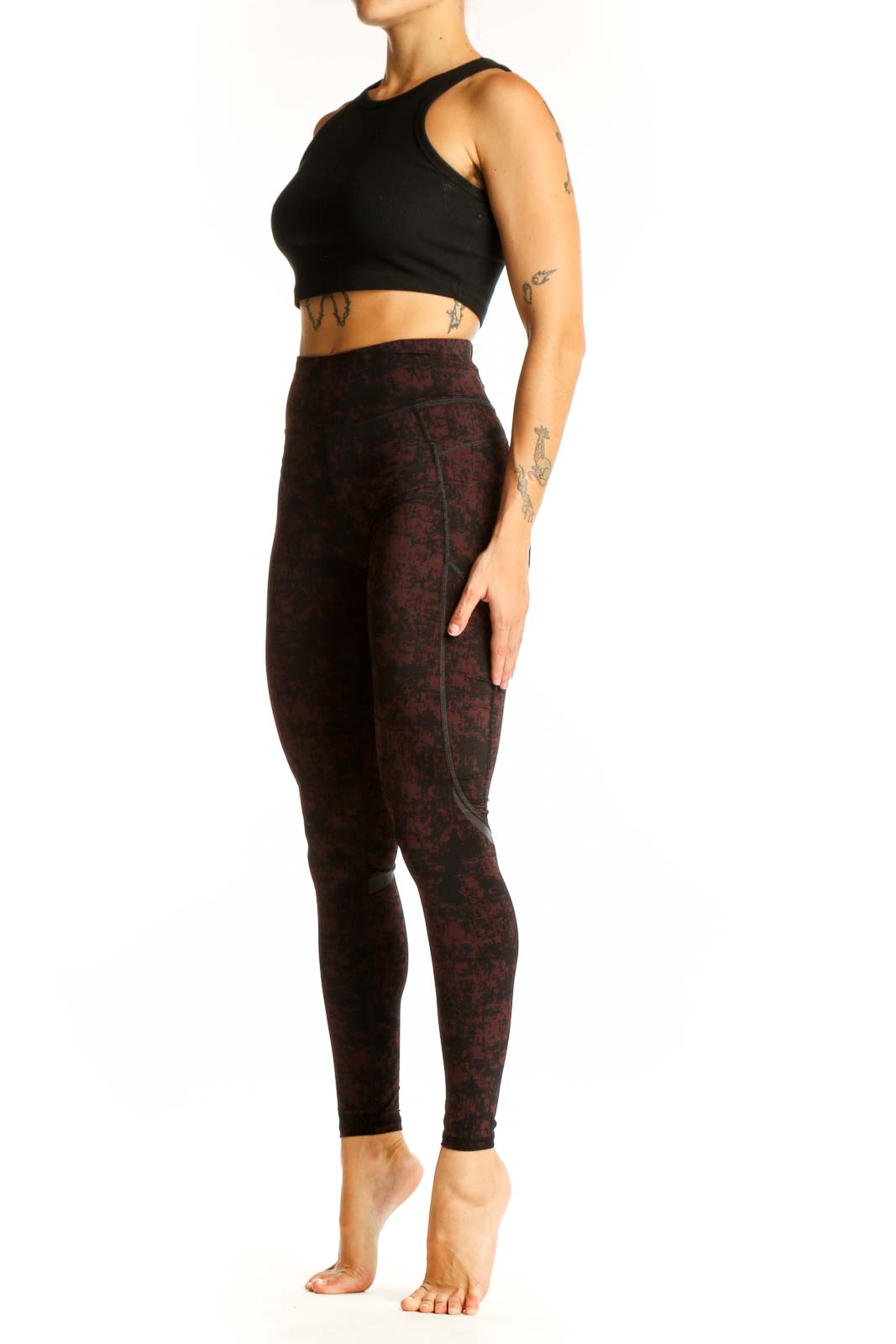 Front view of Sweaty Betty burgundy textured high-waist workout leggings