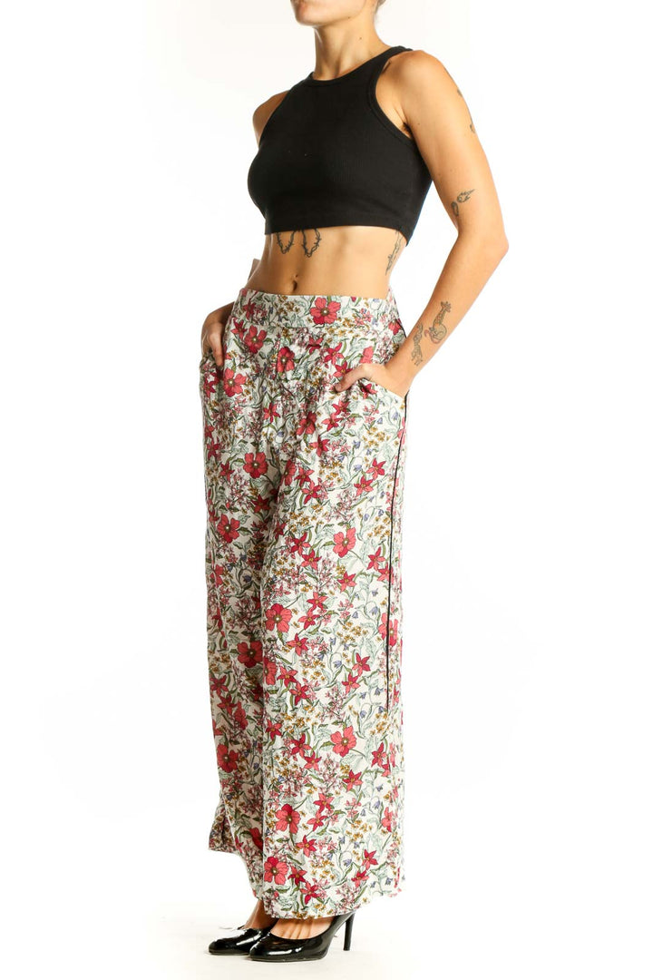 Front view of Jessica Simpson floral viscose palazzo pants with wide legs