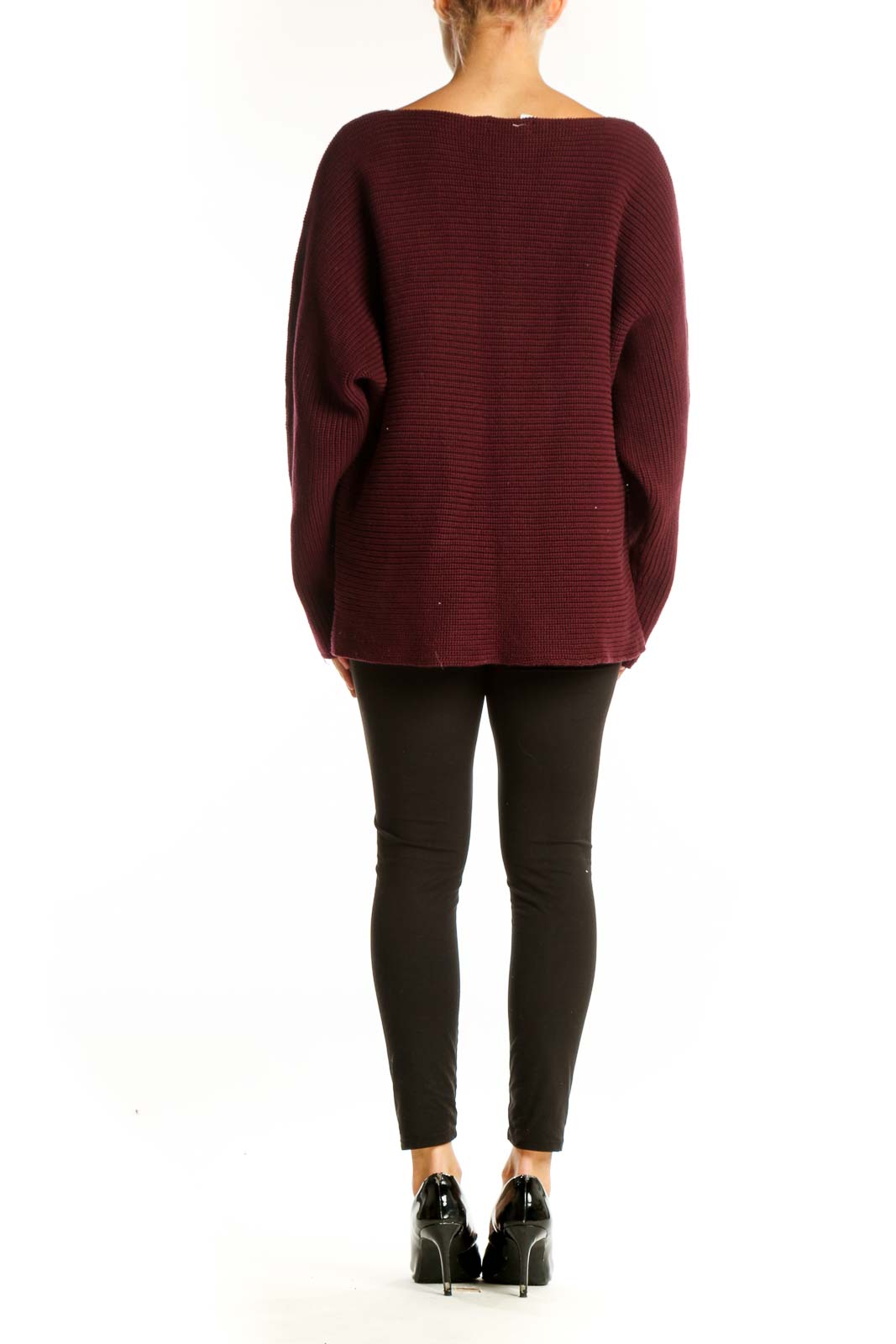 Side view of model wearing burgundy ribbed cotton oversized sweater by Lauren Ralph Lauren