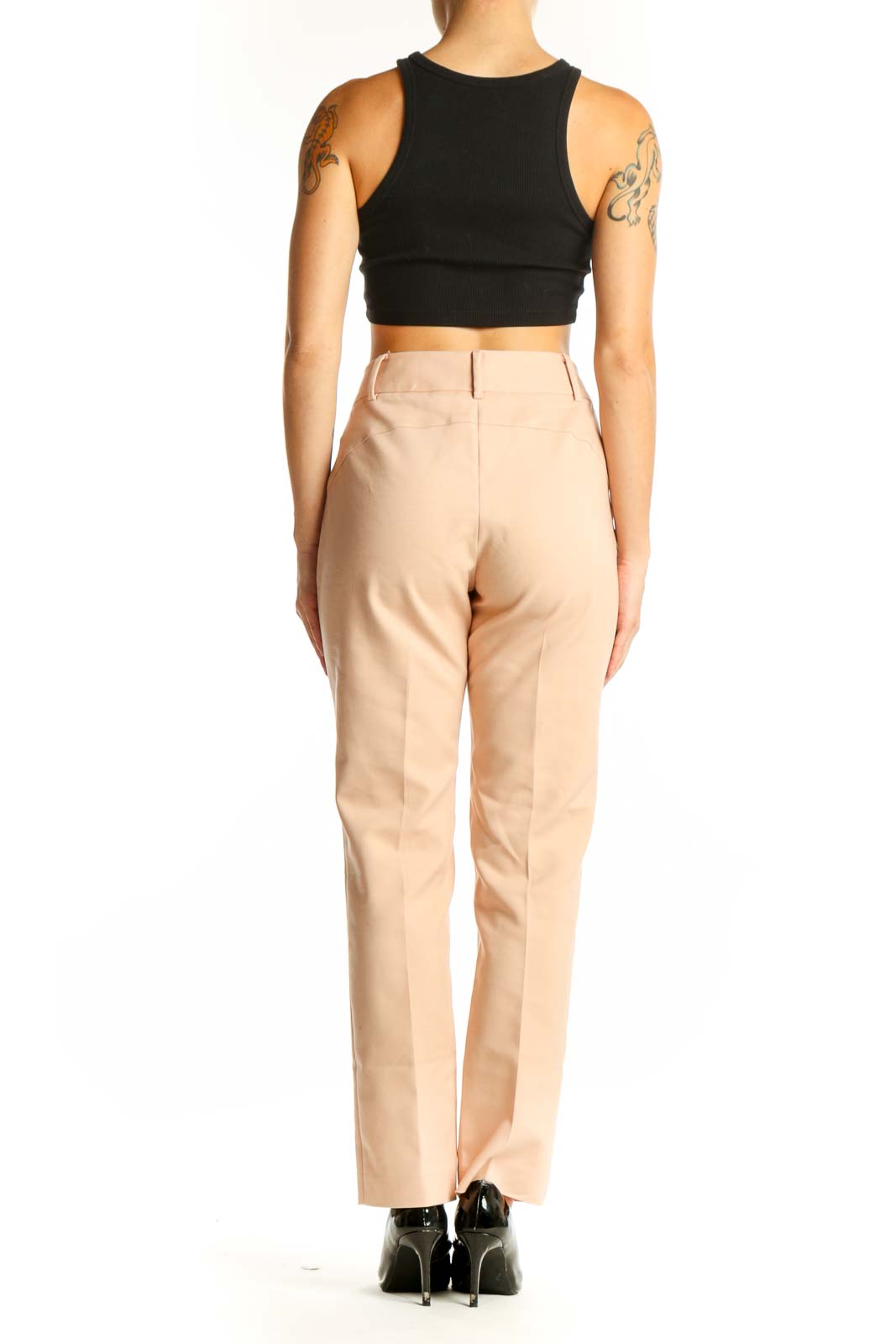 Side view of Chaus beige straight-leg trousers paired with black top