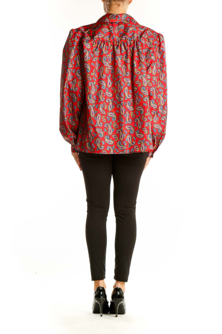 Back view of Laura & Jayne red paisley print button-up blouse