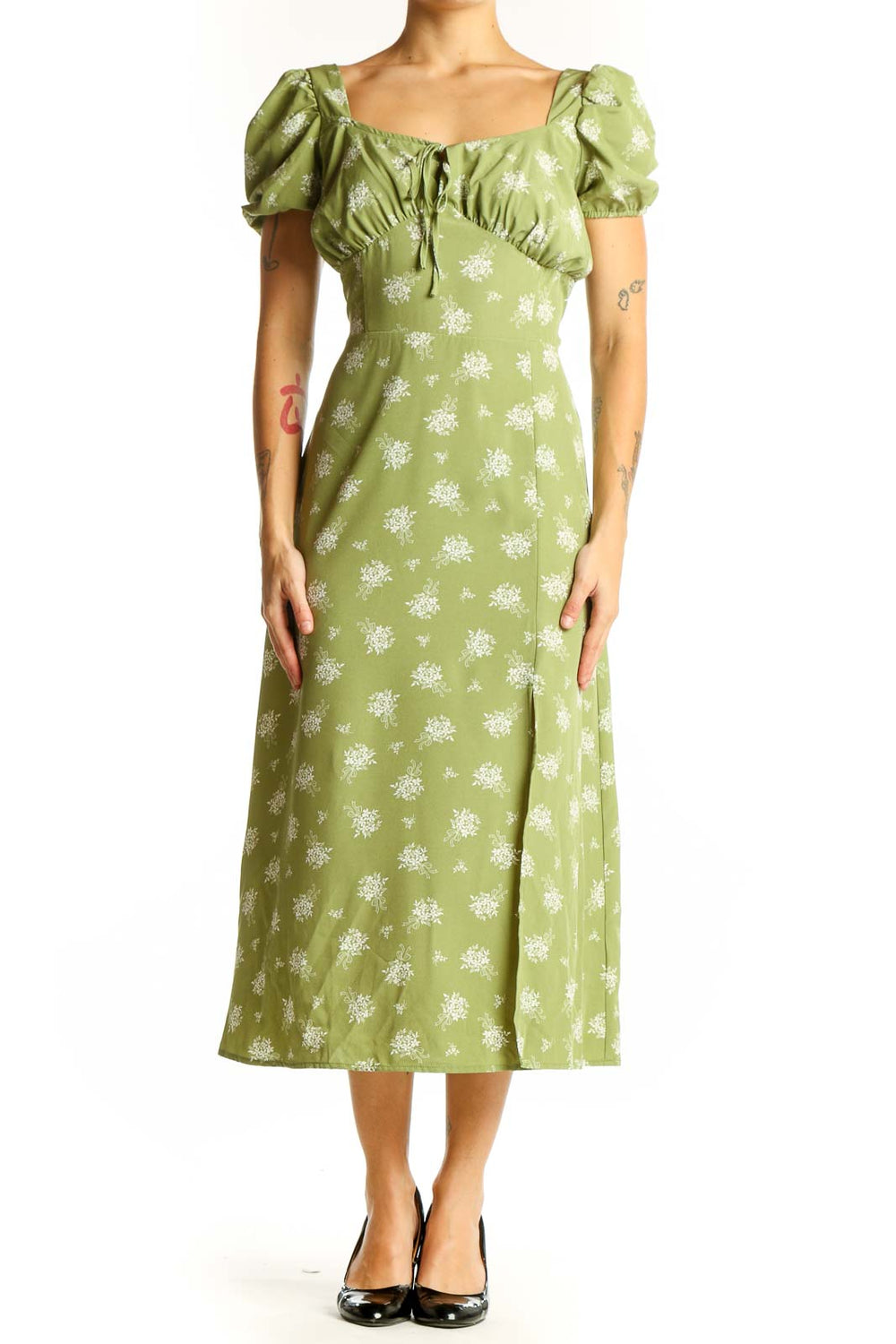 Front view of green floral midi dress with puff sleeves and square neckline