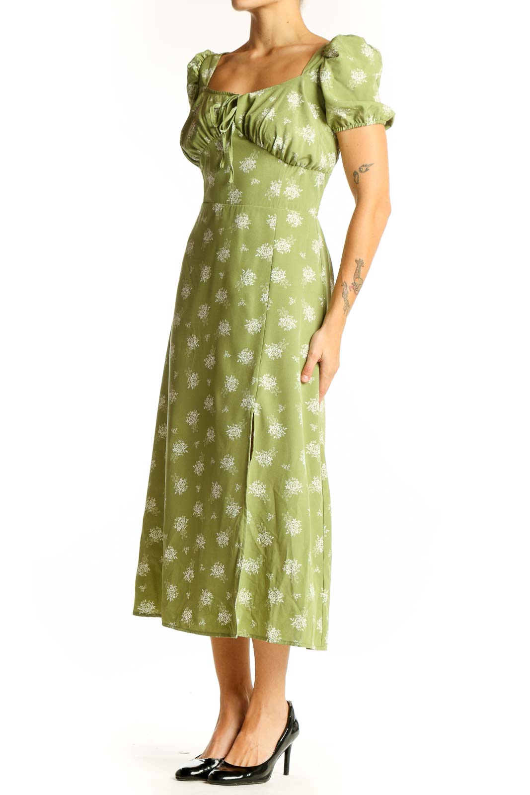 Front view of green floral midi dress with puff sleeves and square neckline