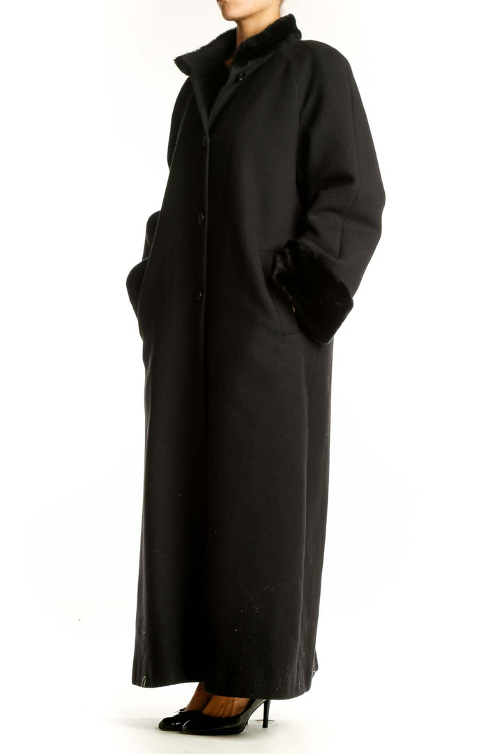 Front view of Harve Bernard black full-length coat with fur-like trim