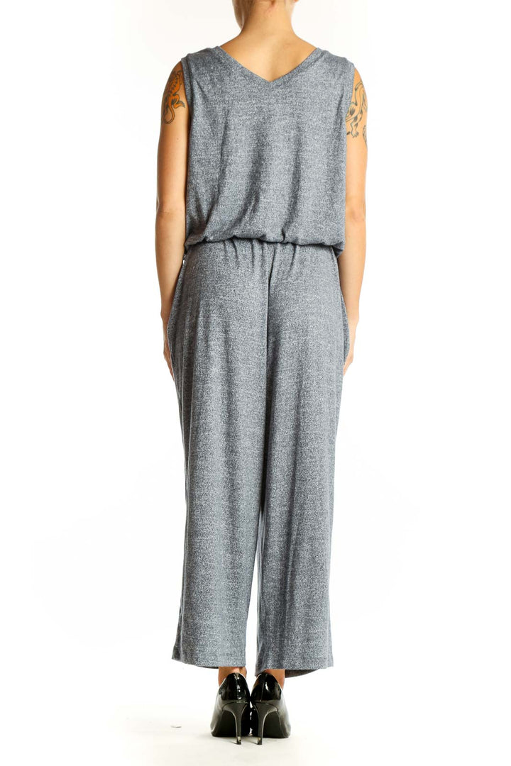 Side view of 32 Degrees gray sleeveless jumpsuit showing relaxed fit
