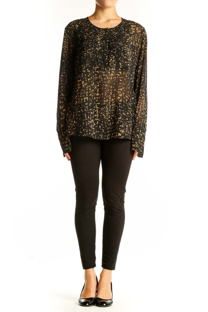 Front view of Converse One Star black and gold abstract print blouse