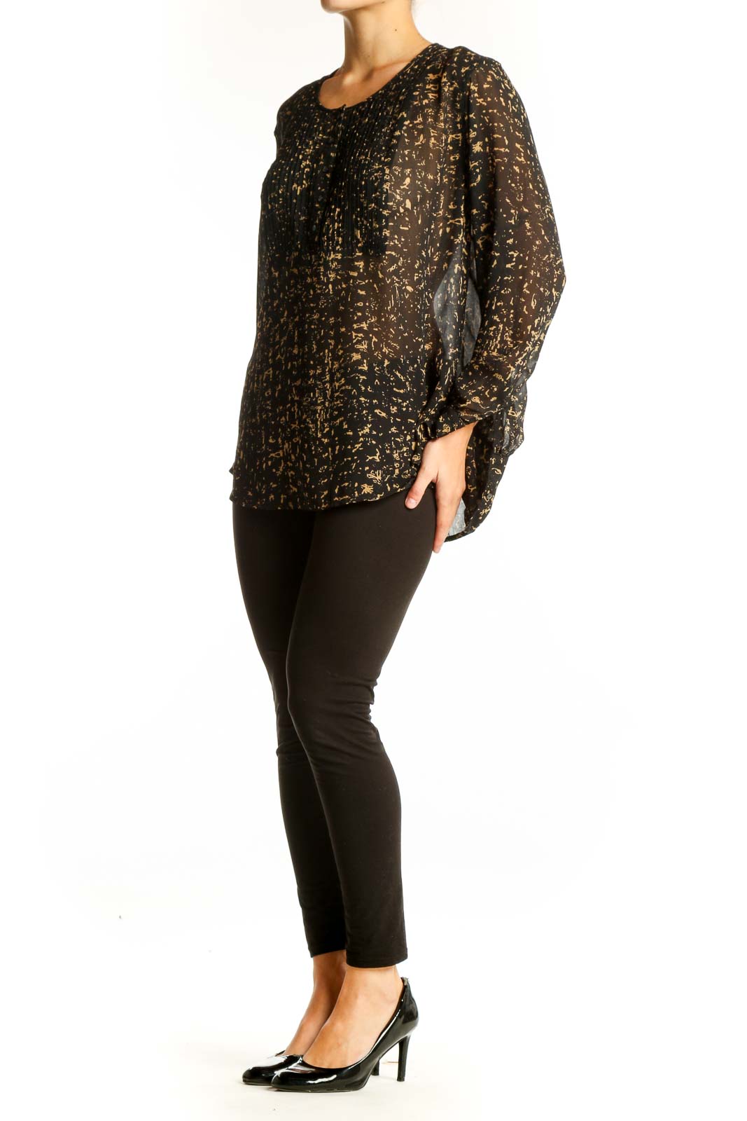 Front view of Converse One Star black and gold abstract print blouse
