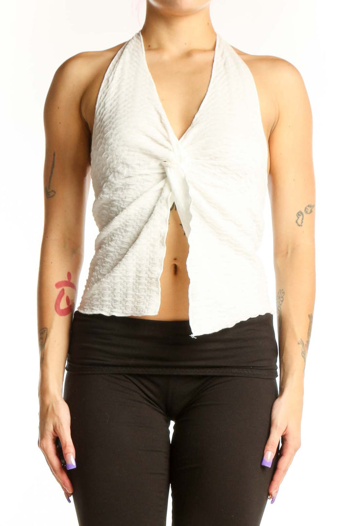 White halter twist crop top with open back detail, front view