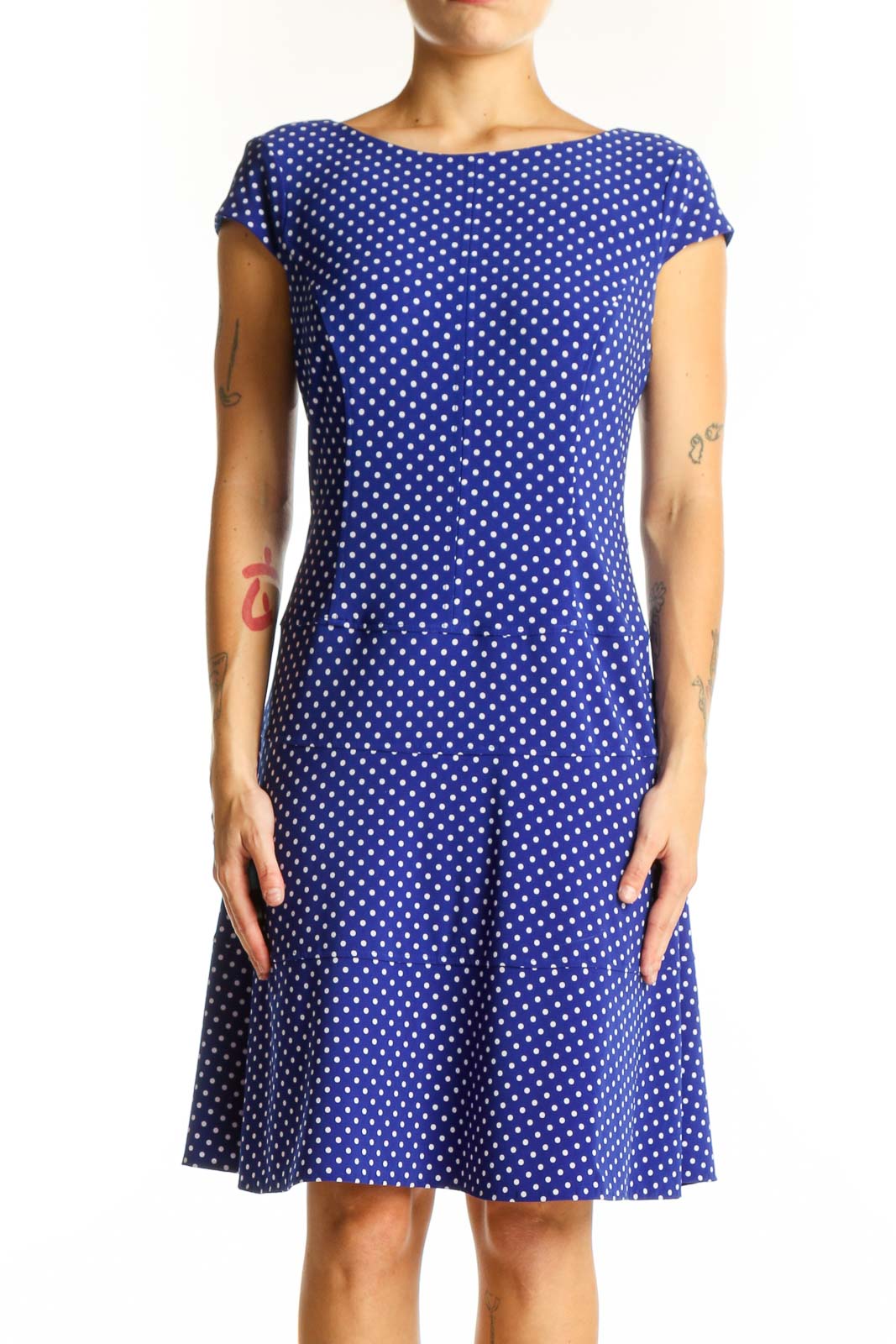 Front view of Anne Klein blue polka dot A-line dress with cap sleeves