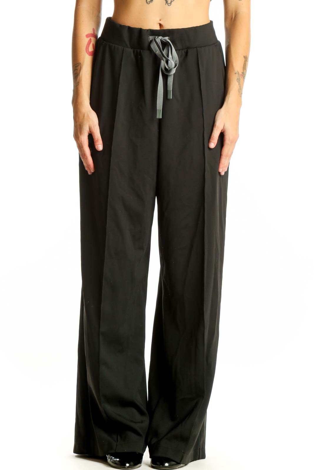 Front view of black wide-leg pants with drawstring waist