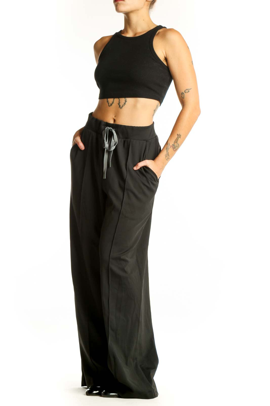 Front view of black wide-leg pants with drawstring waist