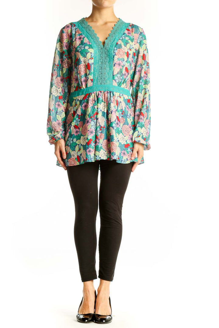 Front view of Matilda Jane teal floral tunic top with lace trim and V-neckline