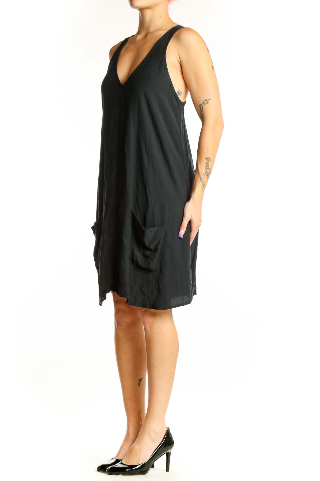 Black V-neck sleeveless dress with asymmetrical hemline and ruched details, front view