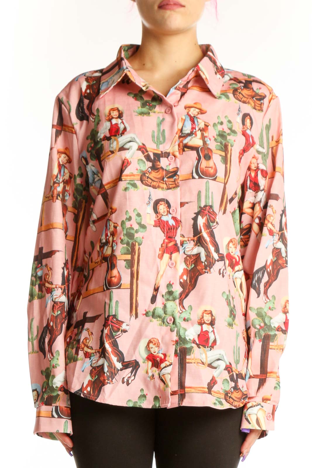 SilkRoll pink western cowgirl print button-up shirt front view featuring retro cowgirl and cactus graphics