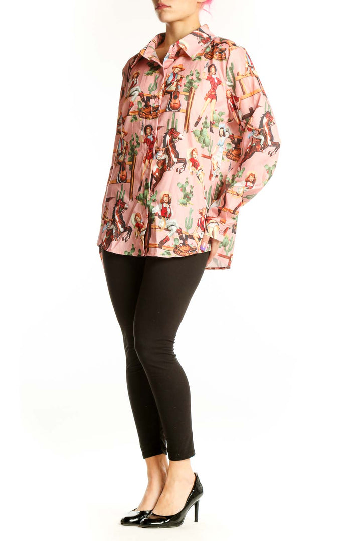 SilkRoll pink western cowgirl print button-up shirt front view featuring retro cowgirl and cactus graphics