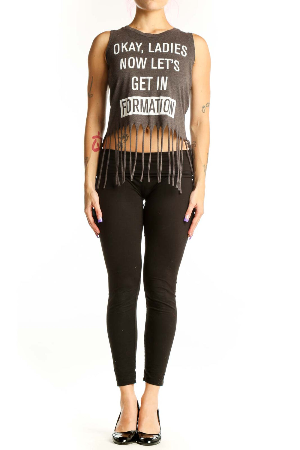 Charcoal graphic cotton tank top with 'Okay Ladies Now Let's Get In Formation' text and black fringe hem detail, front view