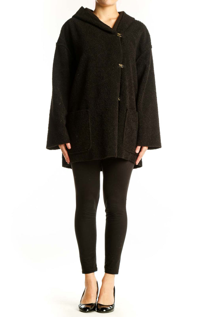 Black hooded polyester jacket with gold buttons and oversized fit, front view