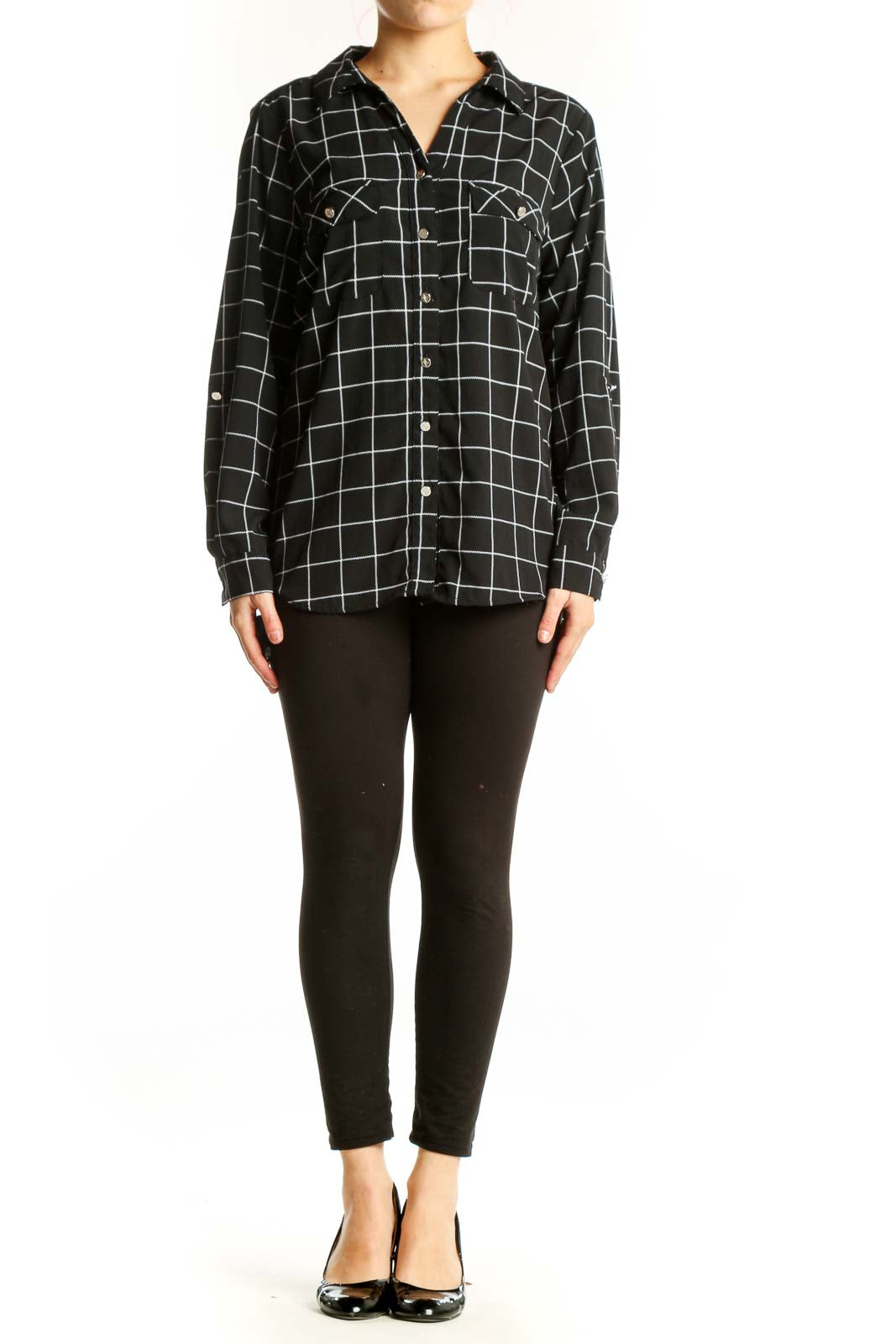 Black and white grid plaid button-up shirt with collared neckline and chest pockets, front view