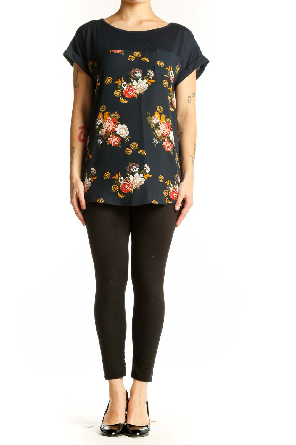 Black floral print short sleeve top by Mason & Belle with red, orange, white, and golden yellow botanical flowers, relaxed fit