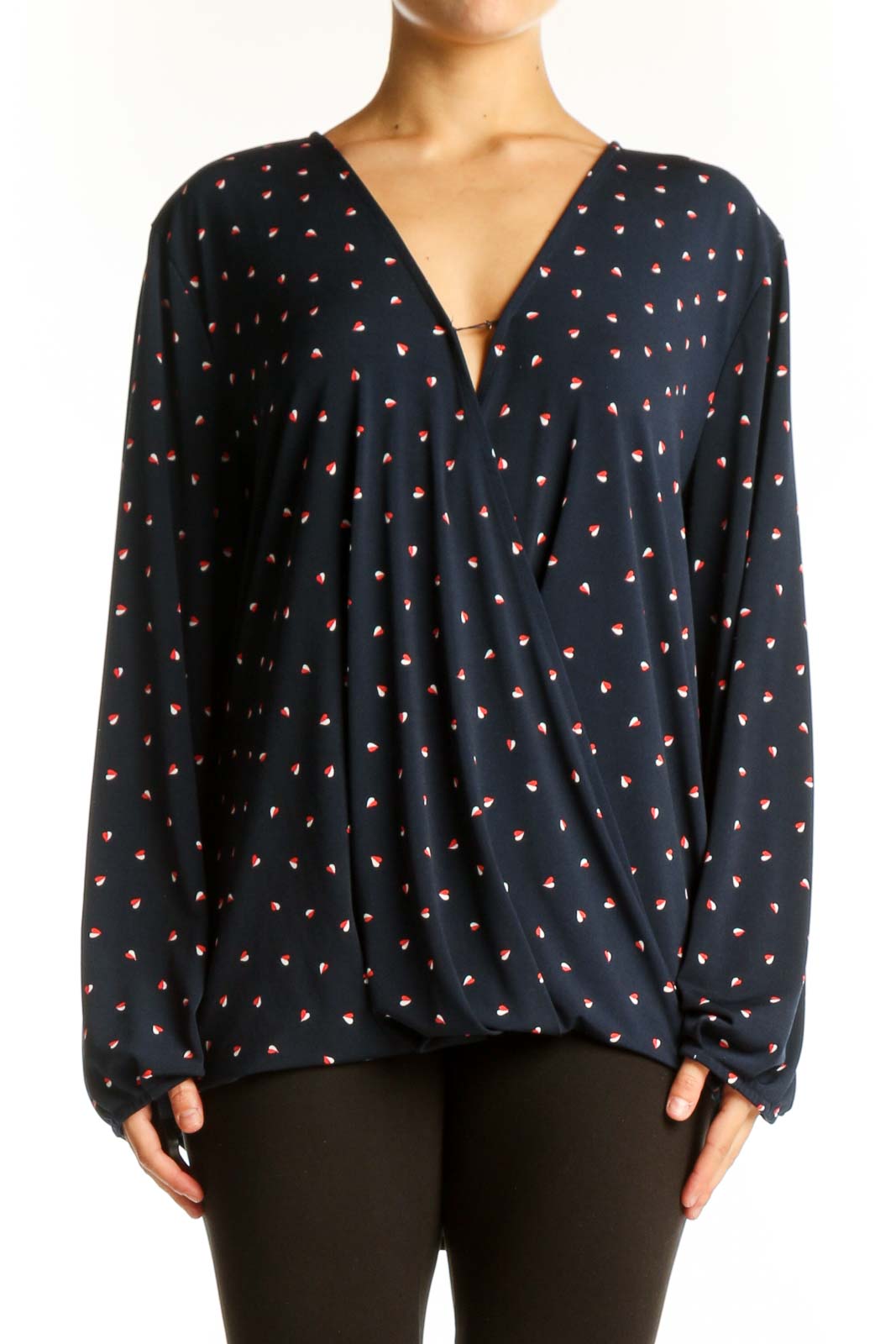 Front view of Banana Republic navy polka dot wrap blouse with V-neckline