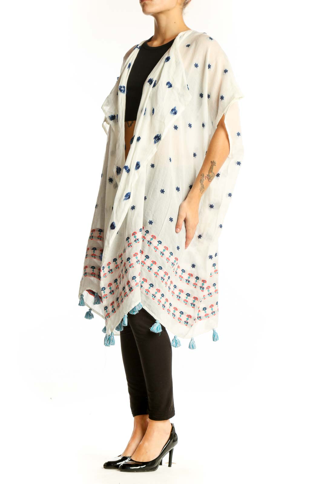 Front view of white J.Crew kimono jacket with blue floral print and tassels