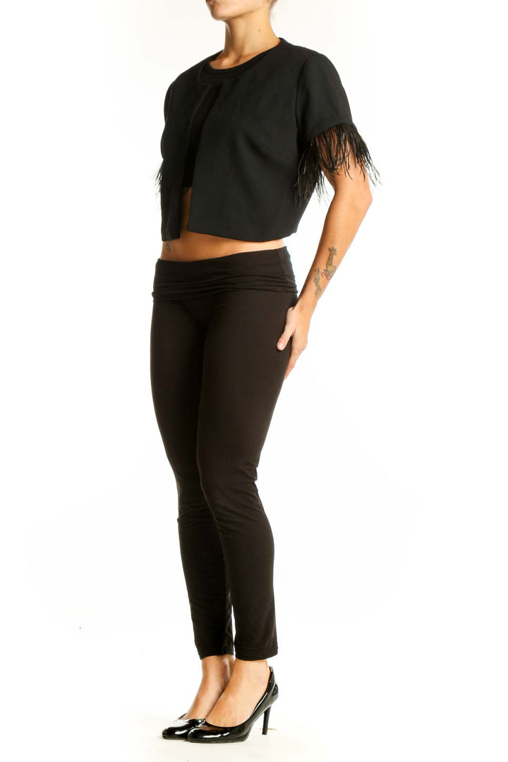 Front view of Black Feather-Trimmed Cropped Jacket from White House Black Market