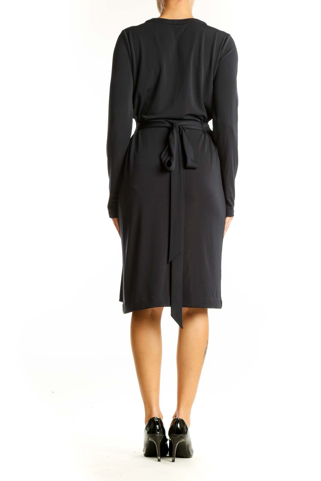Side view of Ann Taylor black wrap-style polyester dress showing ruched waist detail