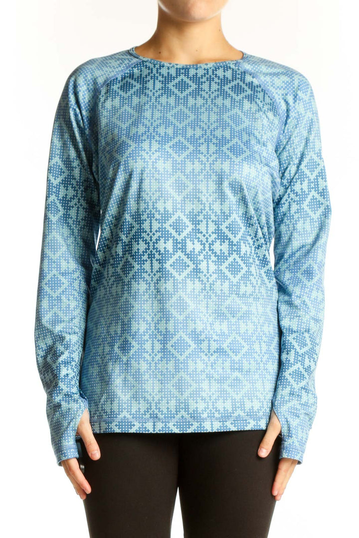 Front view of blue geometric print Nike Pro long sleeve athletic top