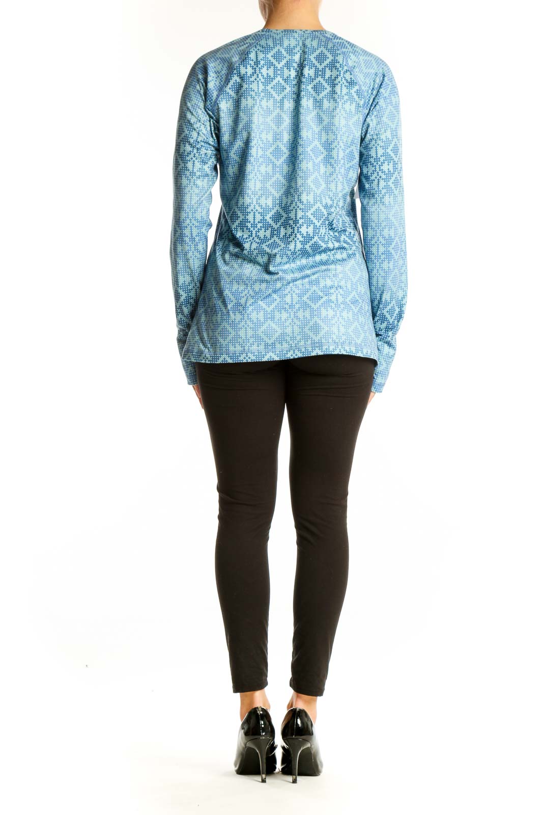 Side view of blue geometric print Nike Pro long sleeve athletic top on model