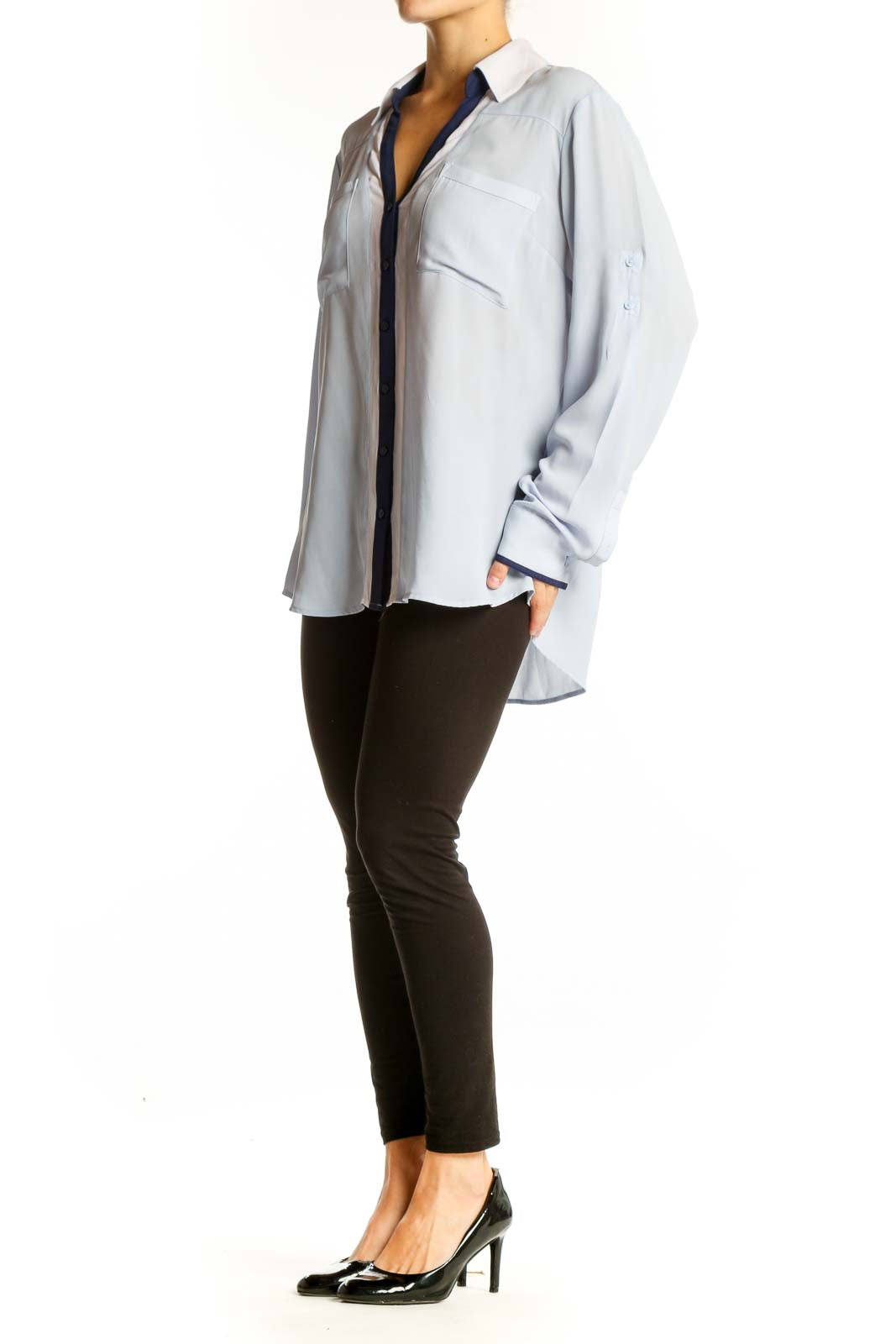 Front view of light blue Express button-up shirt with navy placket