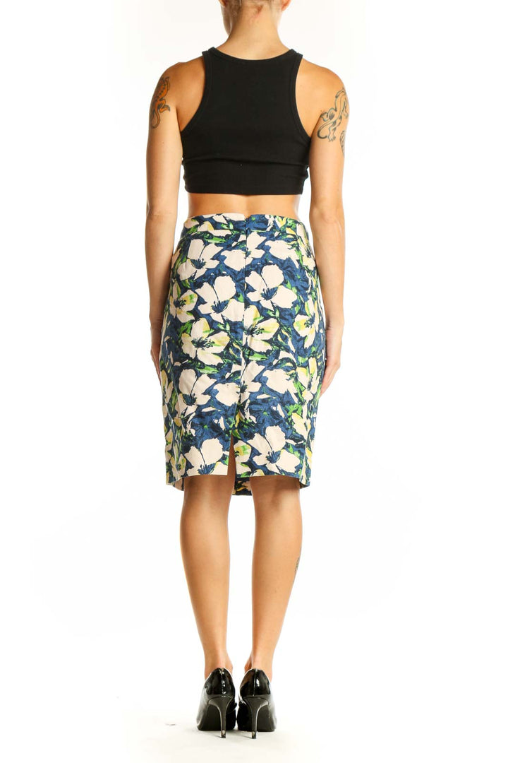 Side view of model wearing J.Crew blue floral printed pencil skirt