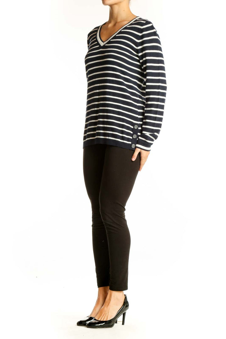 Front view of Talbots navy and white striped V-neck sweater on model