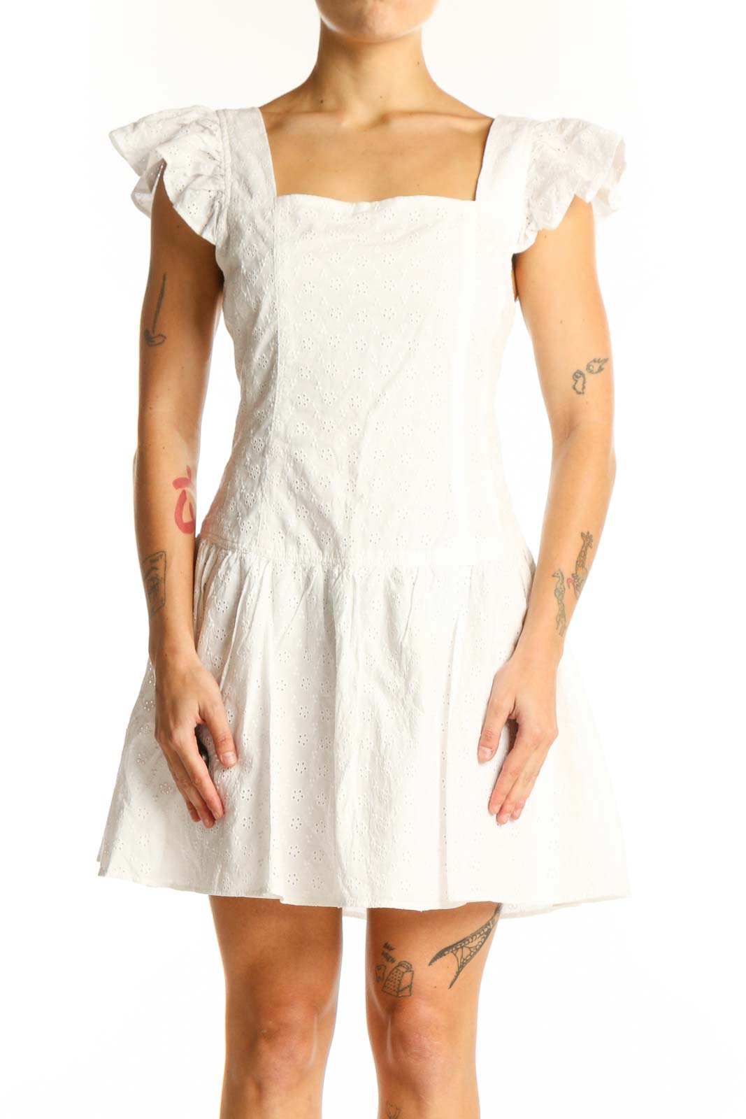 Front view of white eyelet lace mini dress with flutter sleeves