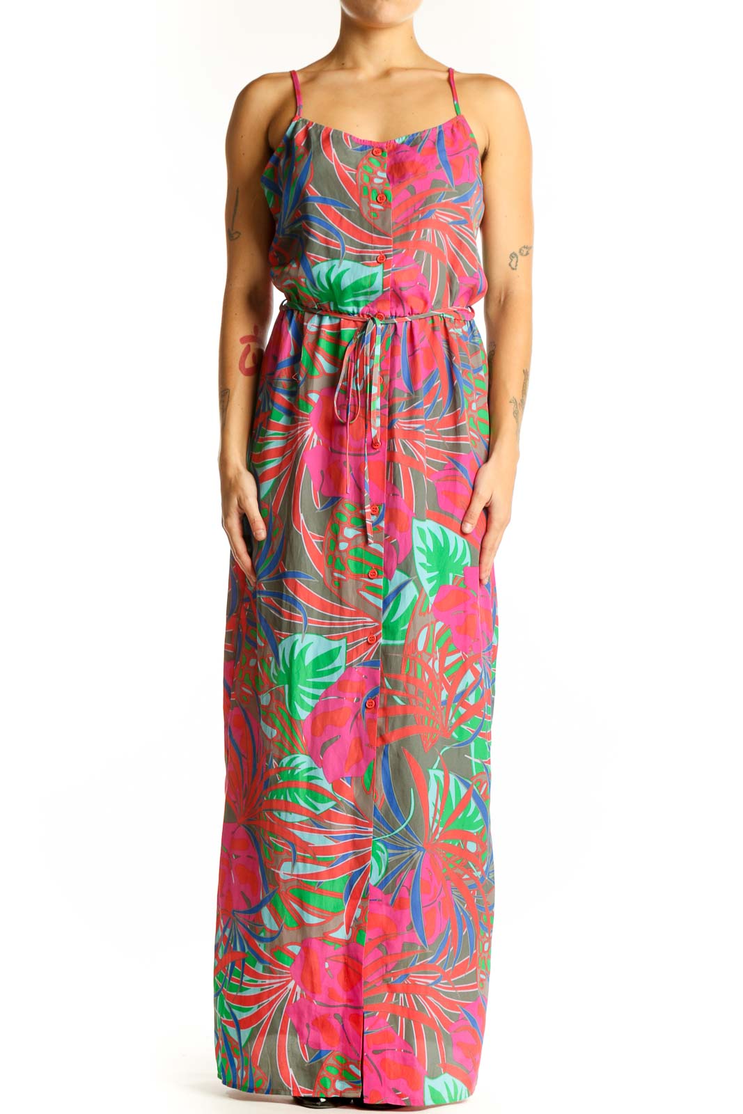 Front view of pink tropical print maxi dress with spaghetti straps