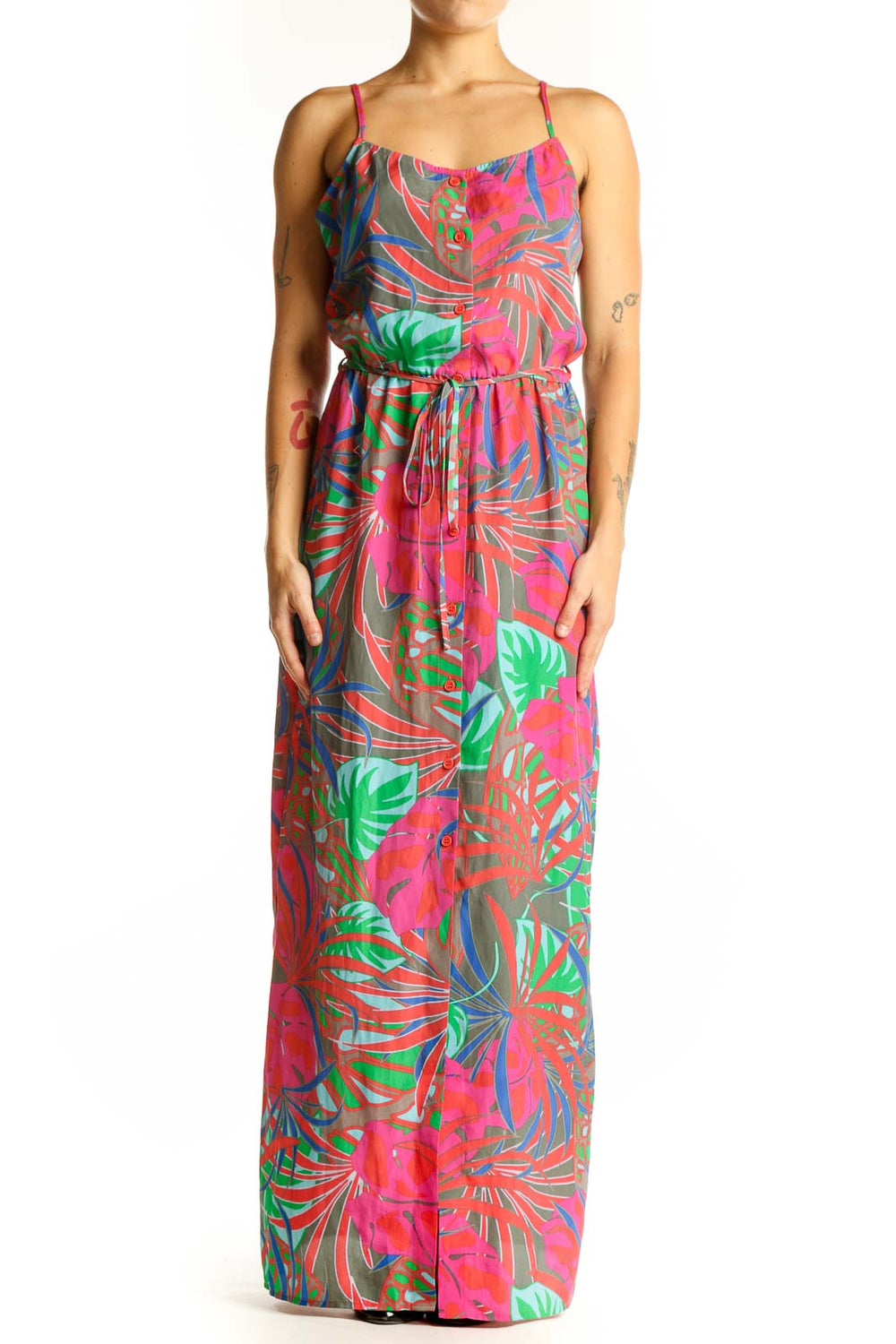 Front view of pink tropical print maxi dress with spaghetti straps