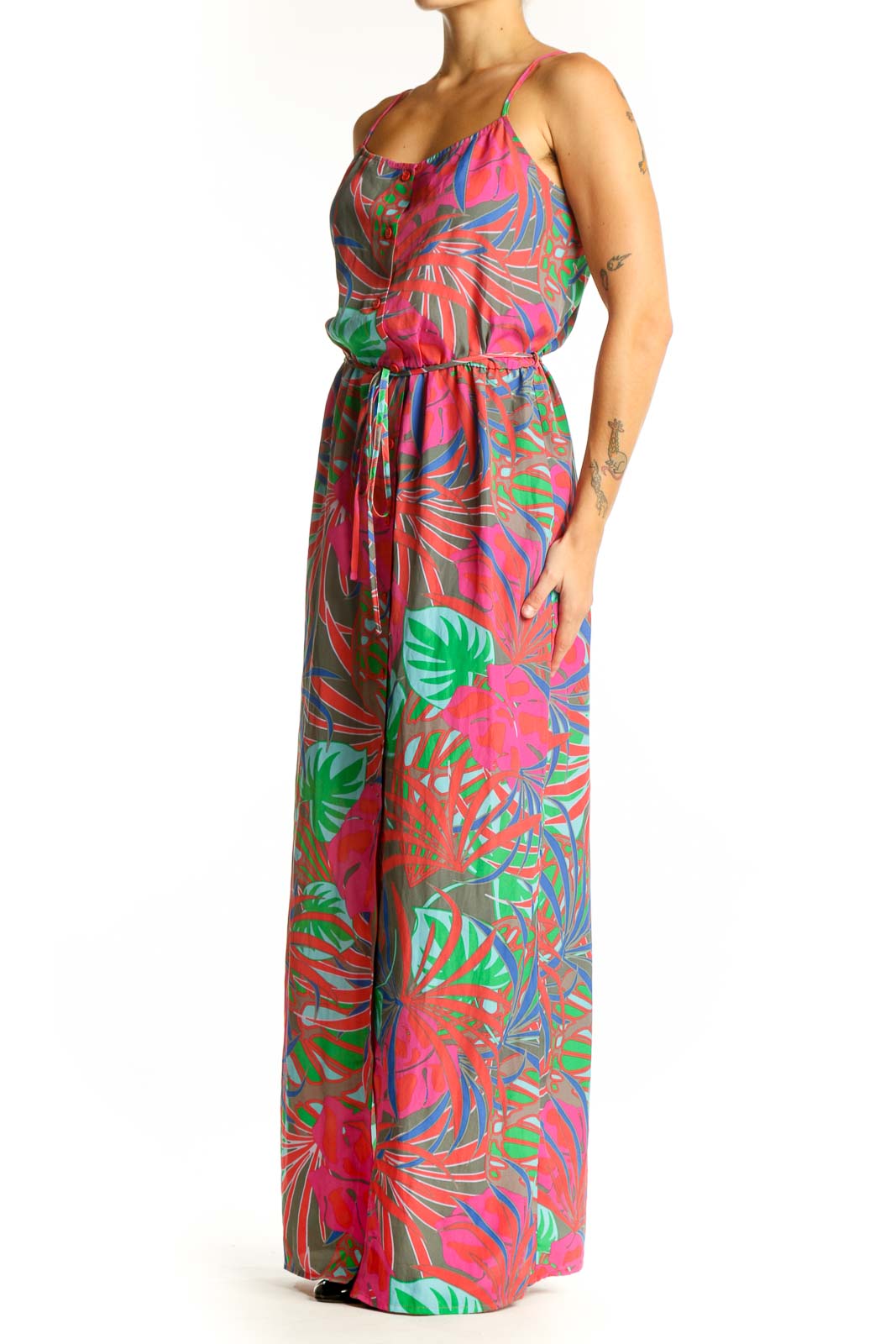 Front view of pink tropical print maxi dress with spaghetti straps