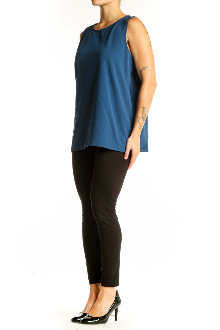 Front view of blue sleeveless Banana Republic tank top on model