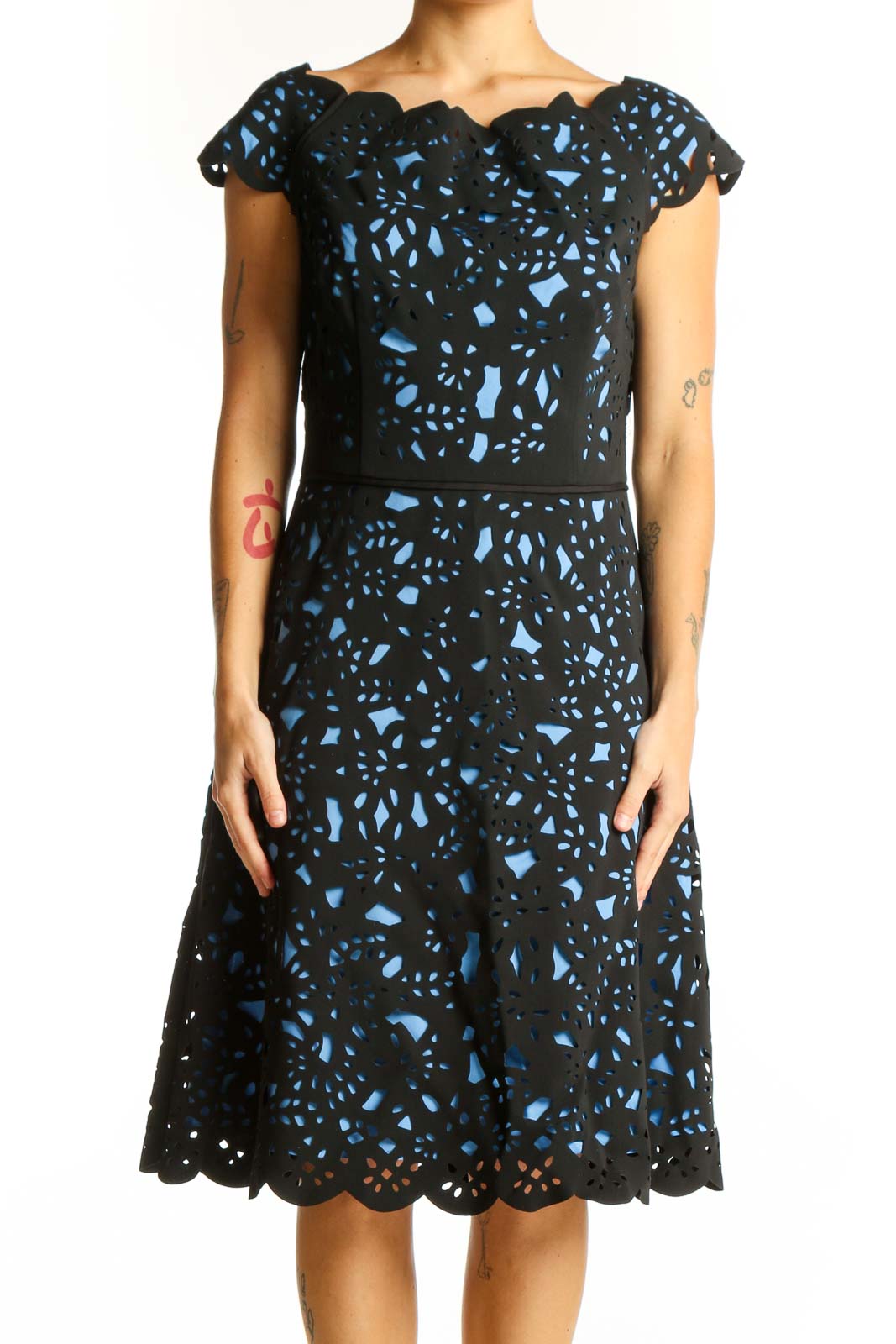 Front view of Nue by Shani Black and Blue Floral Lace Cocktail Dress with scalloped neckline