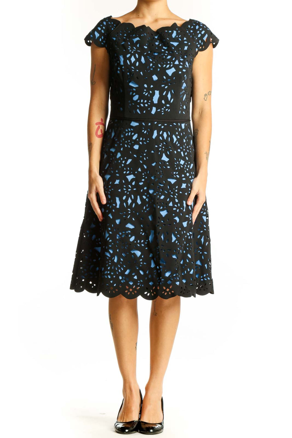 Front view of Nue by Shani Black and Blue Floral Lace Cocktail Dress with scalloped neckline
