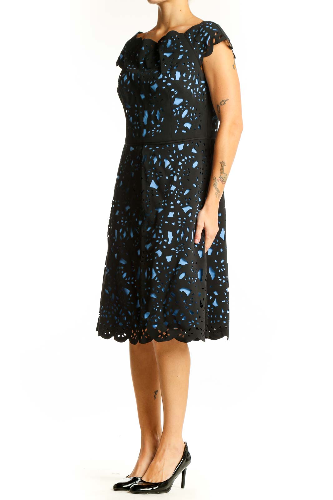 Front view of Nue by Shani Black and Blue Floral Lace Cocktail Dress with scalloped neckline