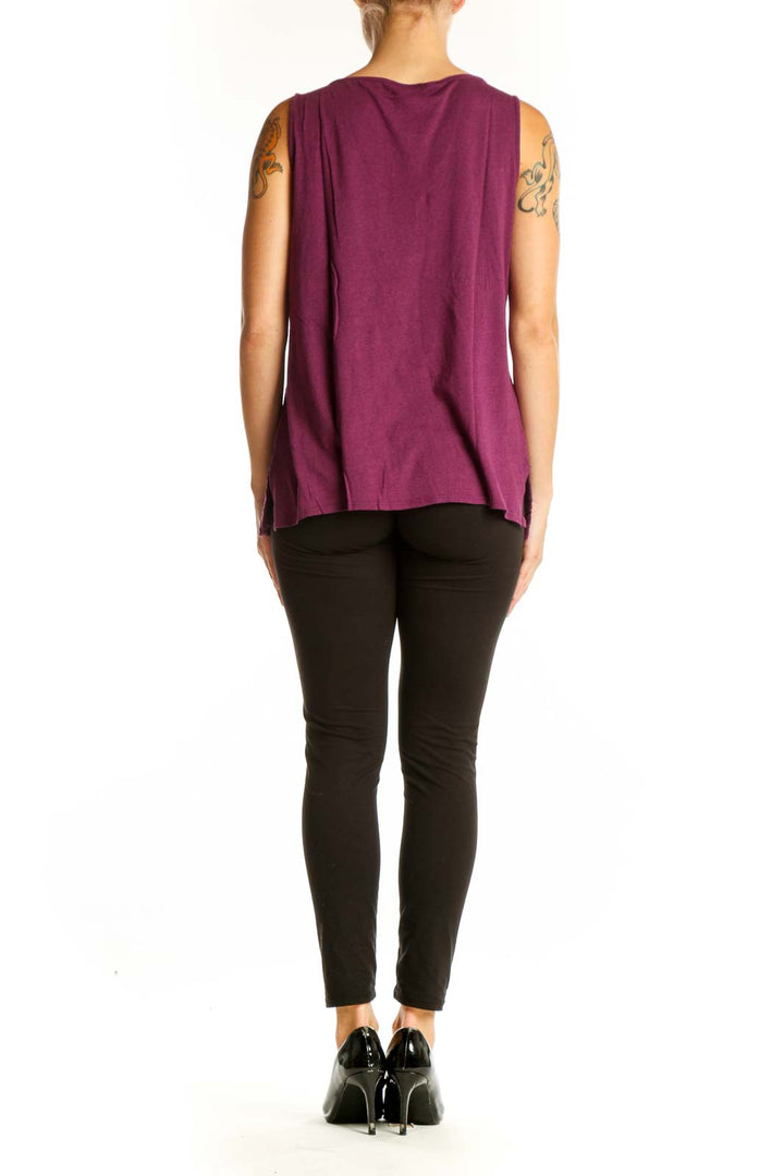 Side view of purple lace sleeveless top from Ann Taylor on model