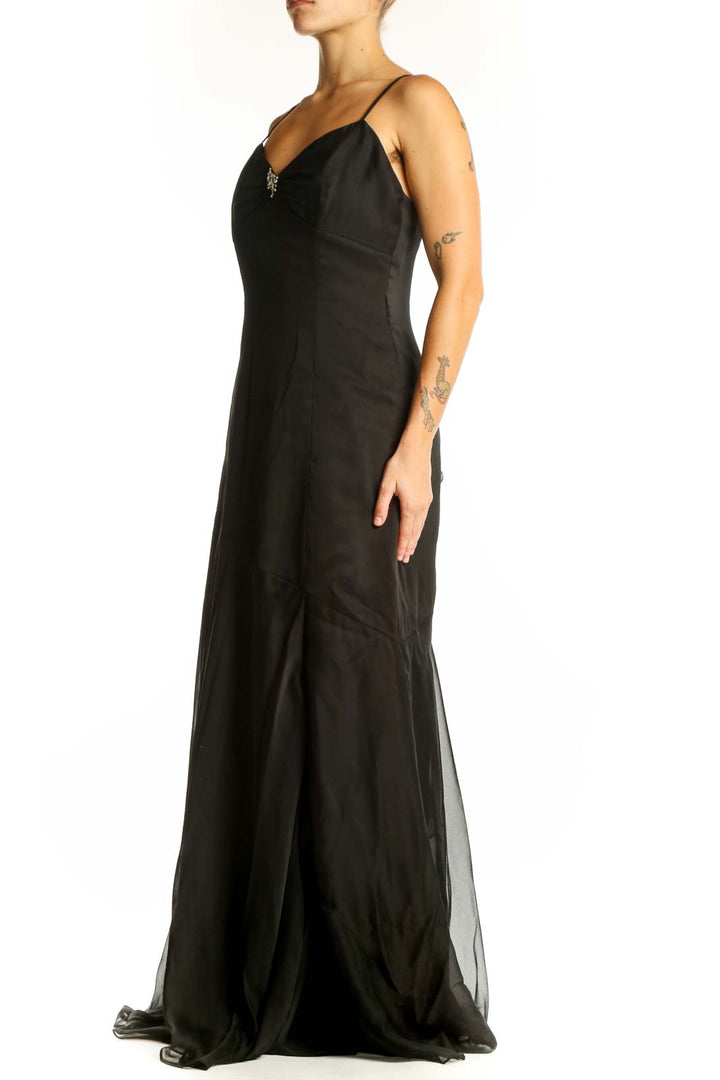 Front view of black Belsoie floor-length gown with sweetheart neckline
