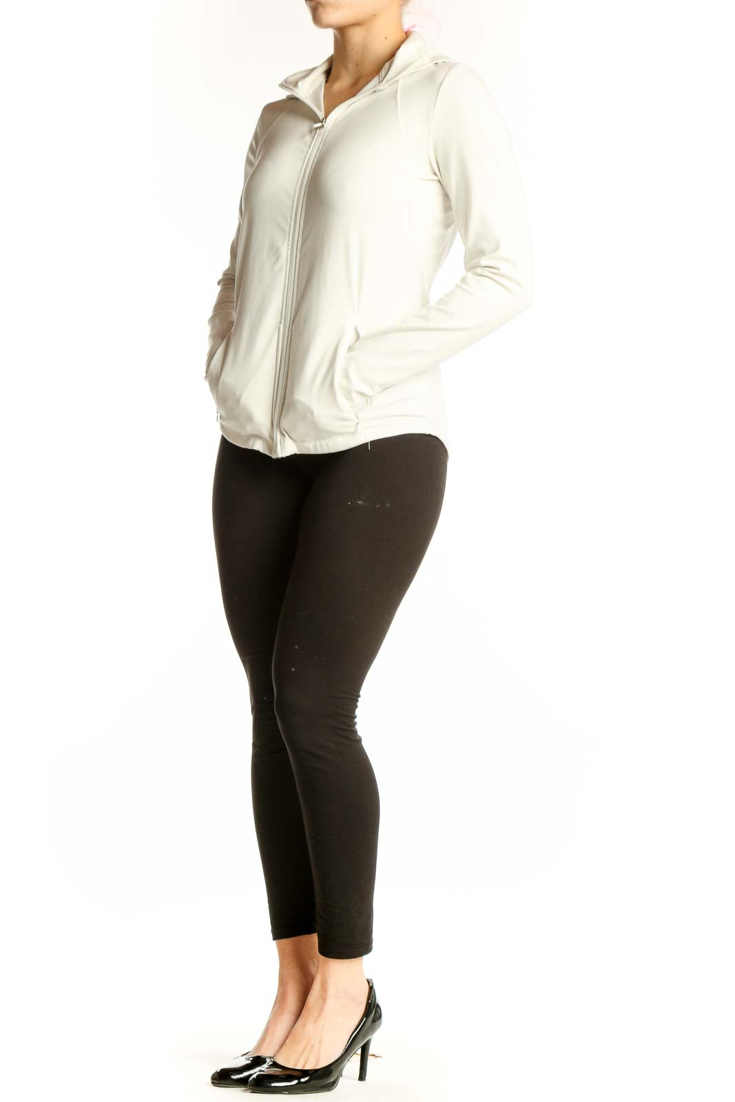 Cream zip-up hooded athletic jacket by Jockey, front view showing fitted silhouette and full-length zipper