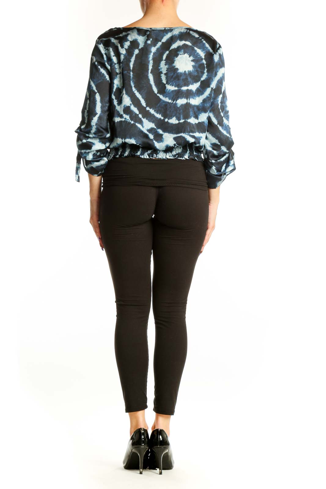 Navy tie-dye spiral print blouse with tie sleeves and gathered waistband, back view