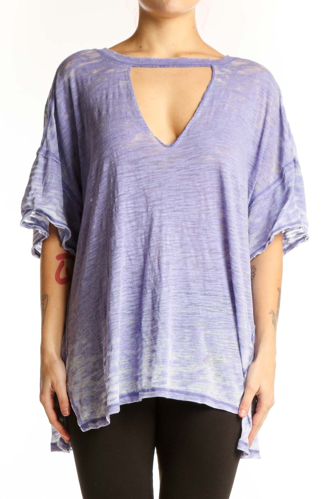 Free People purple cutout V-neck top with ruffled sleeves and asymmetrical hemline, front view on model