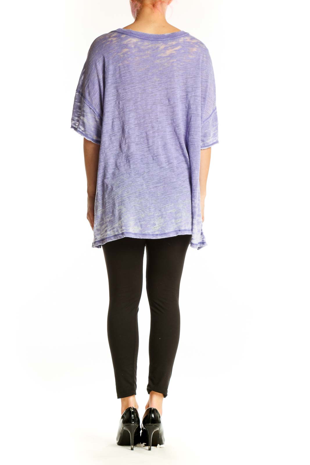 Free People purple cutout V-neck top with ruffled sleeves and asymmetrical hemline, back view on model