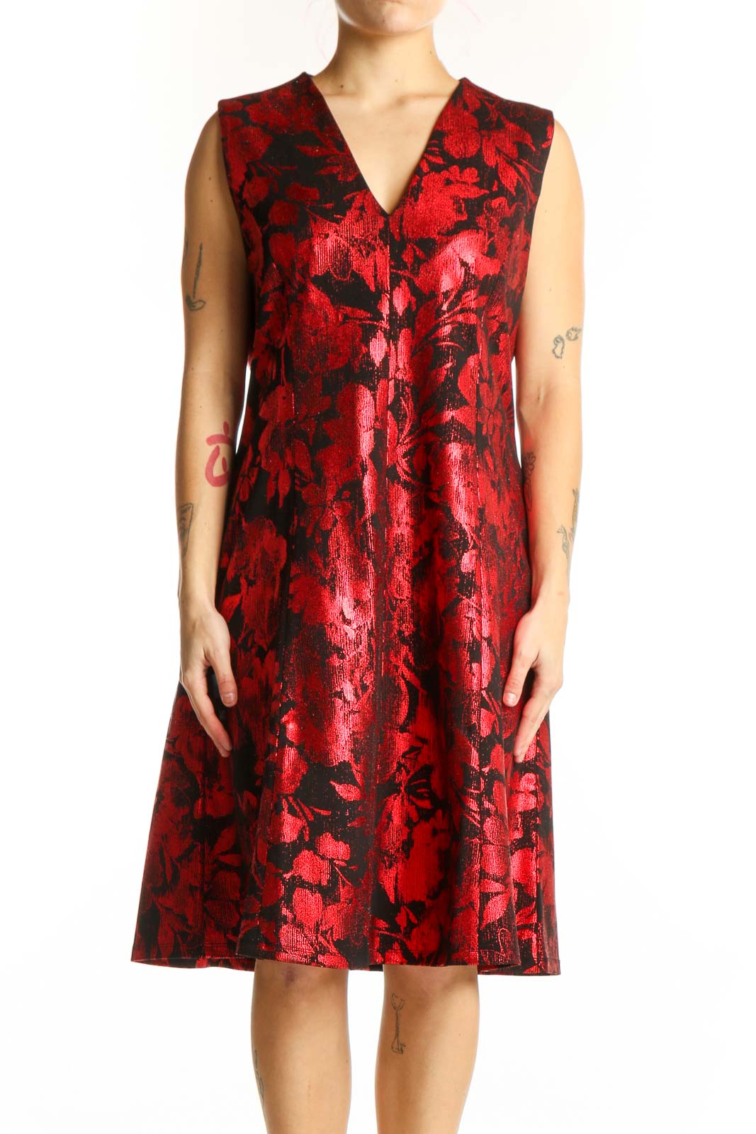 Red and black floral jacquard A-line dress with V-neckline and sleeveless design, front view